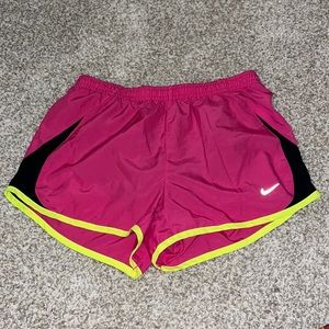 Pink women’s Nike running shorts